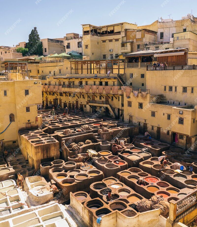 Aerial view of traditional leather tanneries in the old medina of Fes, Morocco Title: Fes Leather Tanneries
