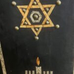 Star of David carving on a wooden panel in a Marrakech synagogue, featured on the Jewish Heritage Tour