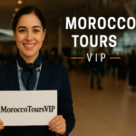 A smiling greeter at Marrakech airport holding a MoroccoToursVIP sign, ready to welcome guests.