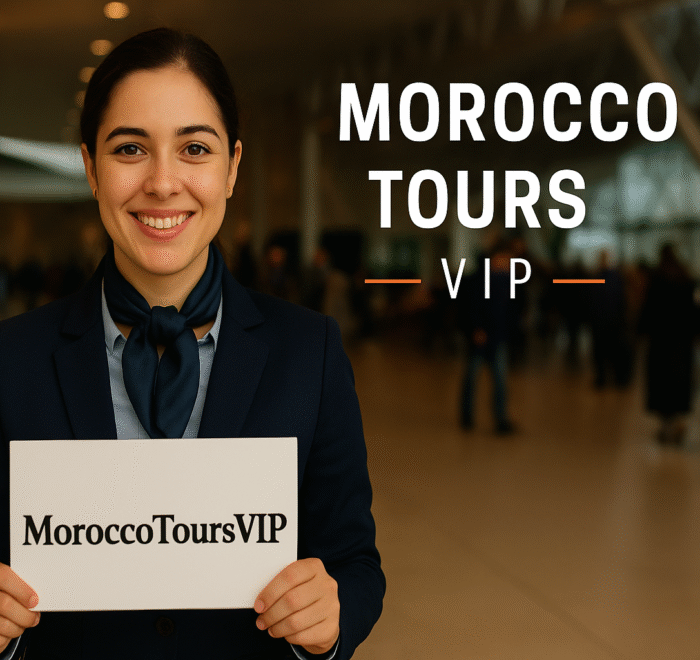 A smiling greeter at Marrakech airport holding a MoroccoToursVIP sign, ready to welcome guests.