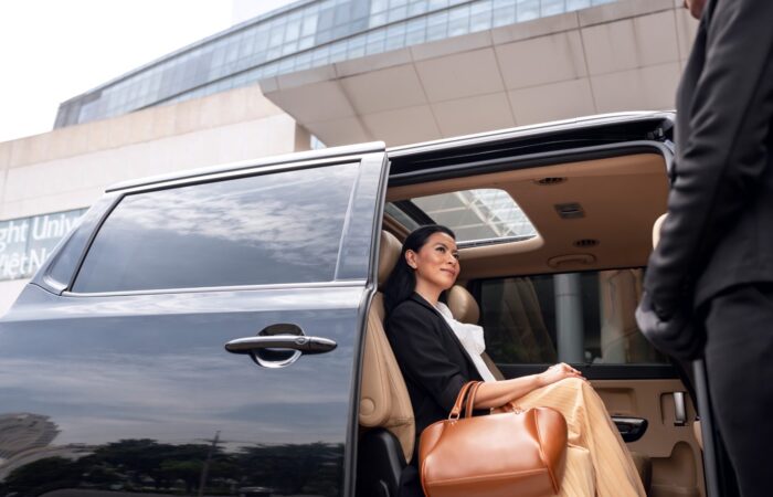 Private airport transfer passenger entering luxury car in Casablanca